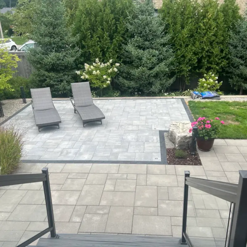 Final form of a Permacon Melville and Unilock Copthorne patio in Hamilton